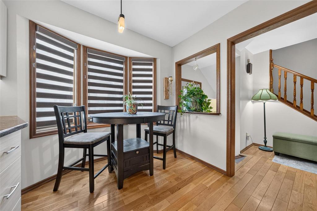 Renovated kitchen with granite counters and bay window